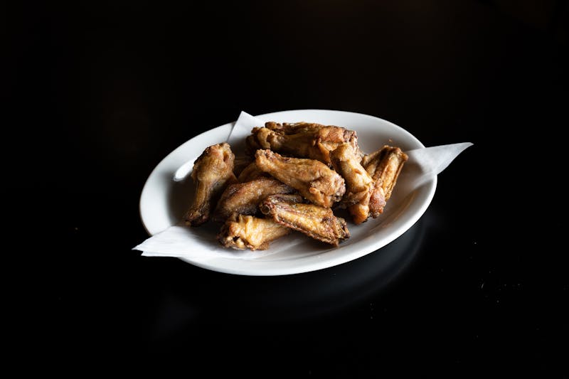 Crispy buffalo wings with blue cheese dip